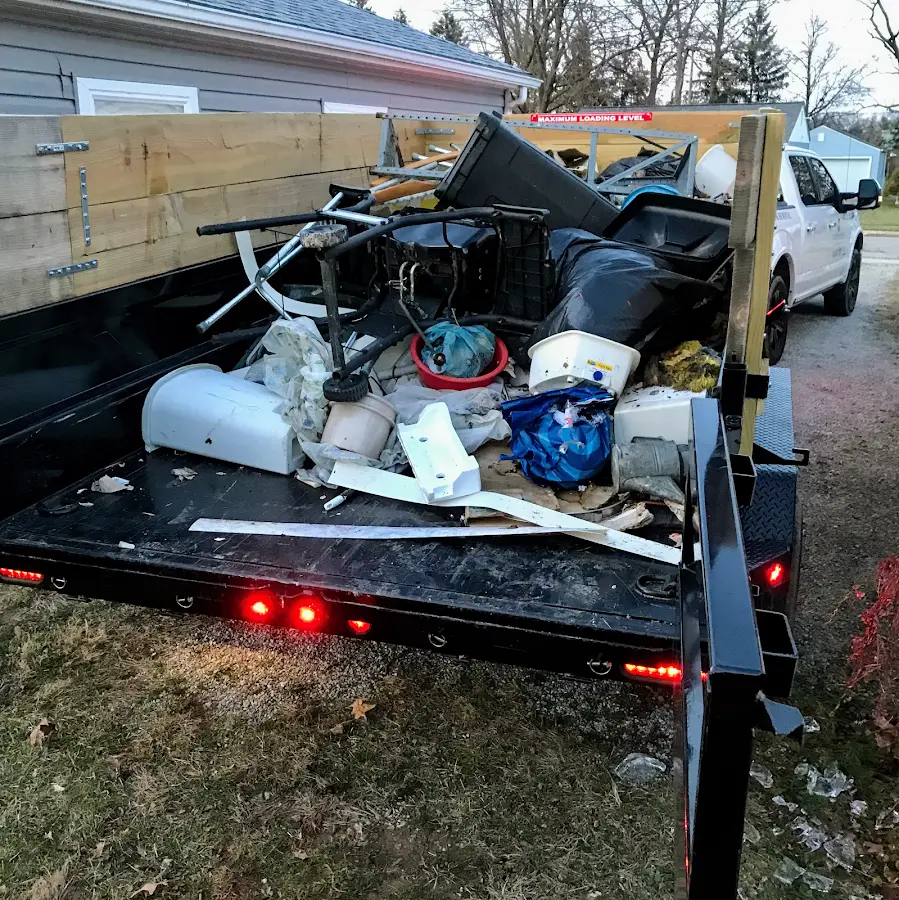 Roll-off dumpster delivered to a residential driveway in Stow